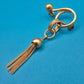 Vintage Brosche mit filigranem Quasten-Anhänger in Gold-Optik