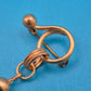 Vintage Brosche mit filigranem Quasten-Anhänger in Gold-Optik