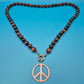 Vintage Holzperlen-Kette mit Peace-Anhänger im Kupfer-Look