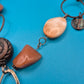 Vintage Statement-Kette mit Federn-Anhänger und Stein-Elementen in Kupfer-Optik