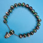 Vintage Glasperlen-Armband in Schwarz-Grün mit Akzentperle