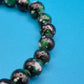 Vintage Glasperlen-Armband in Schwarz-Grün mit Akzentperle