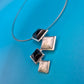 Modernistisches Designer-Collier mit geometrischen Onyx- und Marmor-Elementen