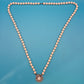 Elegante Vintage Perlenkette mit glitzerndem Strass-Statement-Verschluss