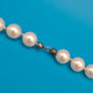 Elegante Vintage Perlenkette mit glitzerndem Strass-Statement-Verschluss