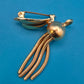 Vintage Goldfarbene Brosche mit beweglichen Schlangenkettchen-Elementen