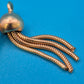 Vintage Goldfarbene Brosche mit beweglichen Schlangenkettchen-Elementen