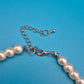 Elegante Vintage Perlenkette mit Kristall-Akzenten und Strasskugel