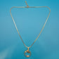 Elegante Vintage Goldfarbene Kette mit Anhänger und Zirkonia-Akzenten