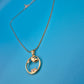 Elegante Vintage Goldfarbene Kette mit Anhänger und Zirkonia-Akzenten