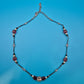 Elegante Vintage-Kette mit dunkelroten Glaskristallen und Strass-Akzent