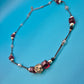 Elegante Vintage-Kette mit dunkelroten Glaskristallen und Strass-Akzent
