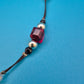 Elegante Vintage-Kette mit dunkelroten Glaskristallen und Strass-Akzent