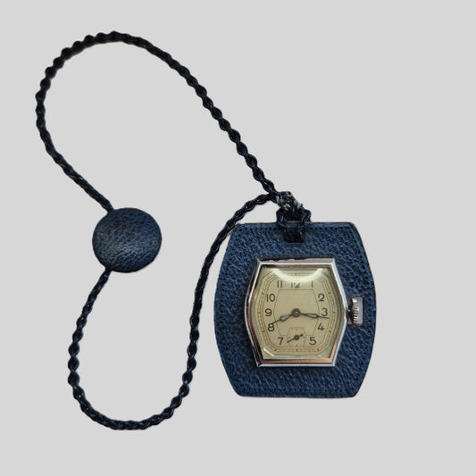 Vintage Taschenuhr mit Ledergehäuse – Einzigartiger Stil