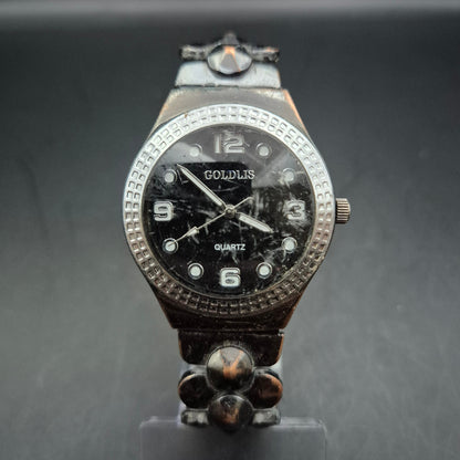 Dekorative Damen Quarzuhr GOLDLIS | Dunkles Metallband | Defektes Glas