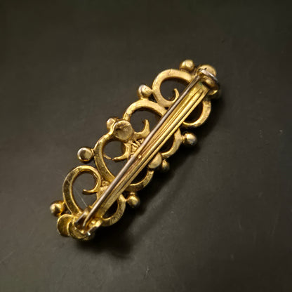 Elegante Vintage Brosche mit filigranem Gold-Design