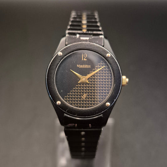 Vintage Maddox Armbanduhr – Schwarz-Gold mit Gittermuster