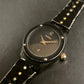 Vintage Maddox Armbanduhr – Schwarz-Gold mit Gittermuster - Bild 2