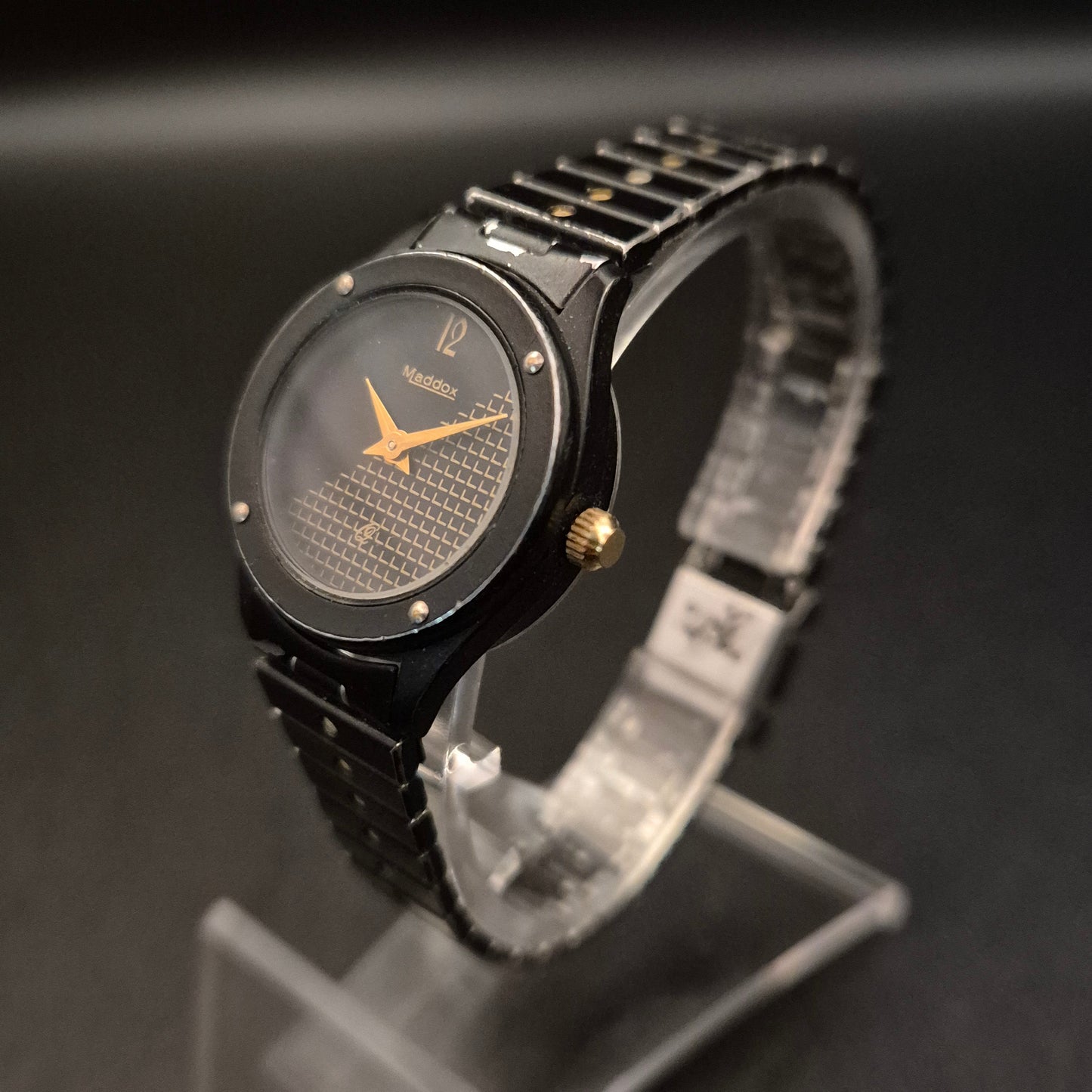 Vintage Maddox Armbanduhr – Schwarz-Gold mit Gittermuster - Bild 5