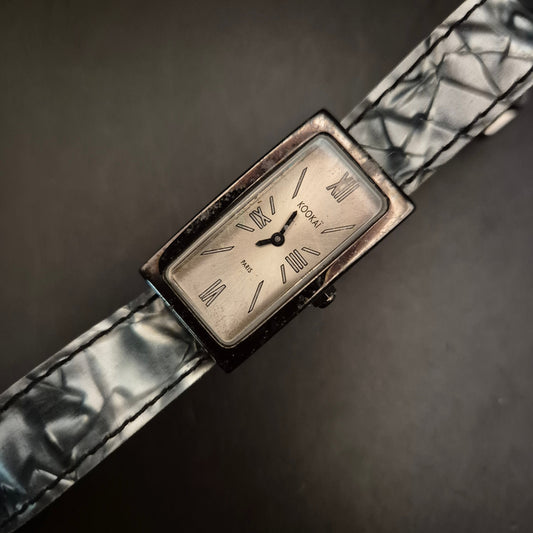 Elegante Vintage Kookai Paris Damenuhr mit strukturiertem Band