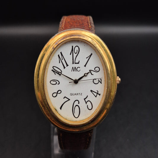 Vintage Damenuhr MC Quartz – Ovales Gehäuse, Goldfarben, Lederarmband