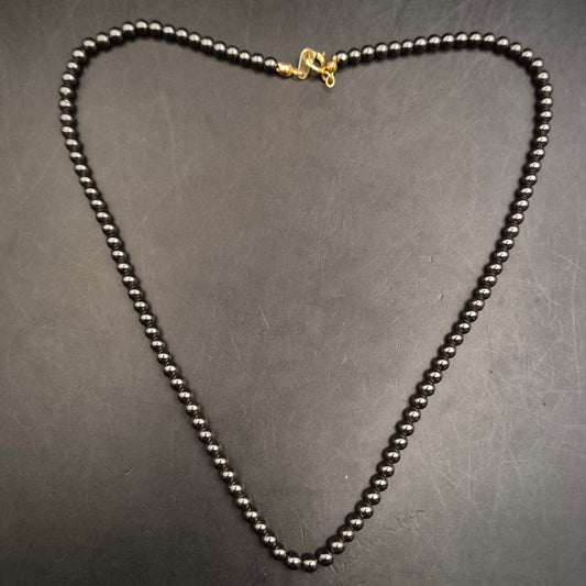 Elegante Hämatit-Perlenhalskette mit glänzendem Goldverschluss