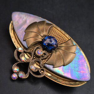 Elegante Vintage Brosche mit schillernder Muschel und Strass
