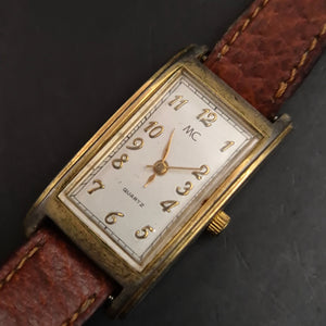 Elegante Vintage Damenuhr MC, Quarz, goldfarben mit braunem Leder