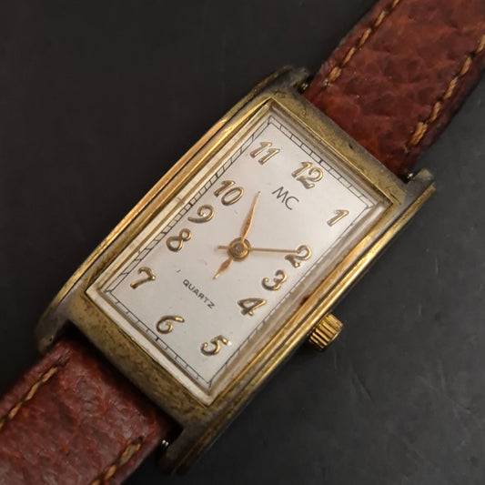 Elegante Vintage Damenuhr MC, Quarz, goldfarben mit braunem Leder
