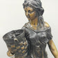 Antike Bronze-Optik Skulptur – Junge Frau mit Körben, Dekofigur