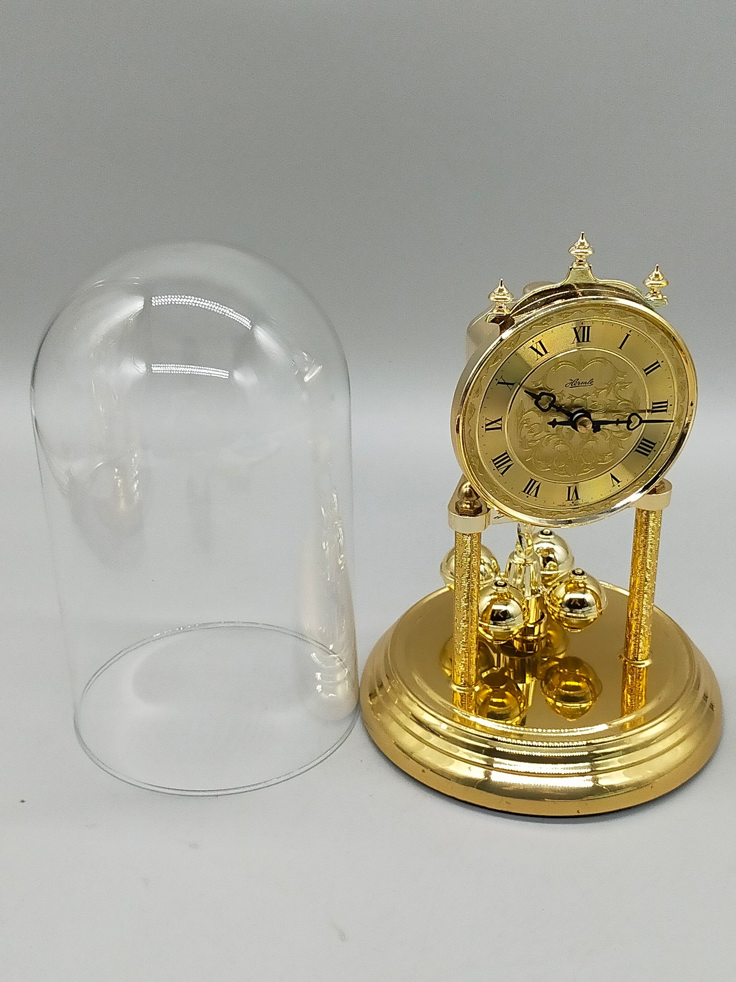 Klassische Hermle Drehpendel Uhr  Messing Design mit Glasdom