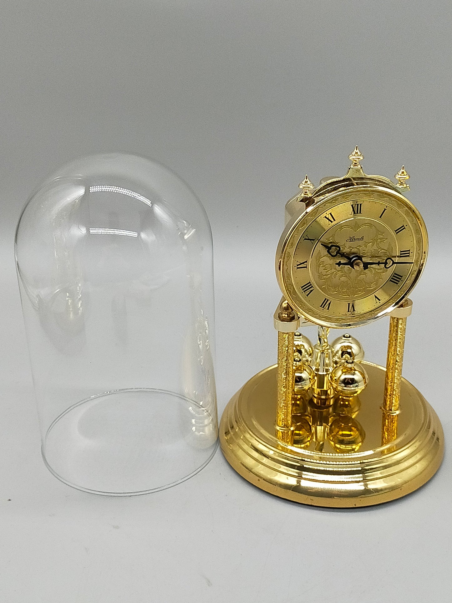 Klassische Hermle Drehpendel Uhr  Messing Design mit Glasdom