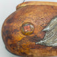 Traditionelles Inro aus Holz mit Schnitzereien und Kordel