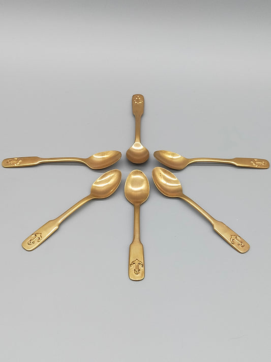 Sechs goldfarbene Löffel mit Anker-Motiv Maritimes Vintage-Besteck