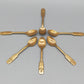Sechs goldfarbene Löffel mit Anker-Motiv Maritimes Vintage-Besteck