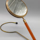 Antiker Tischspiegel mit Bernstein optik Griff Vintage Kosmetikspiegel