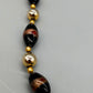 Elegante Muranoglas Damen Kette Schwarz und Gold für zeitlose Eleganz