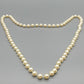 Klassische Perlenkette in Creme Zeitloser Schmuck für jeden Anlass