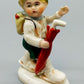Vintage Porzellan Figur Wanderjunge mit Regenschirm Klassisches Design
