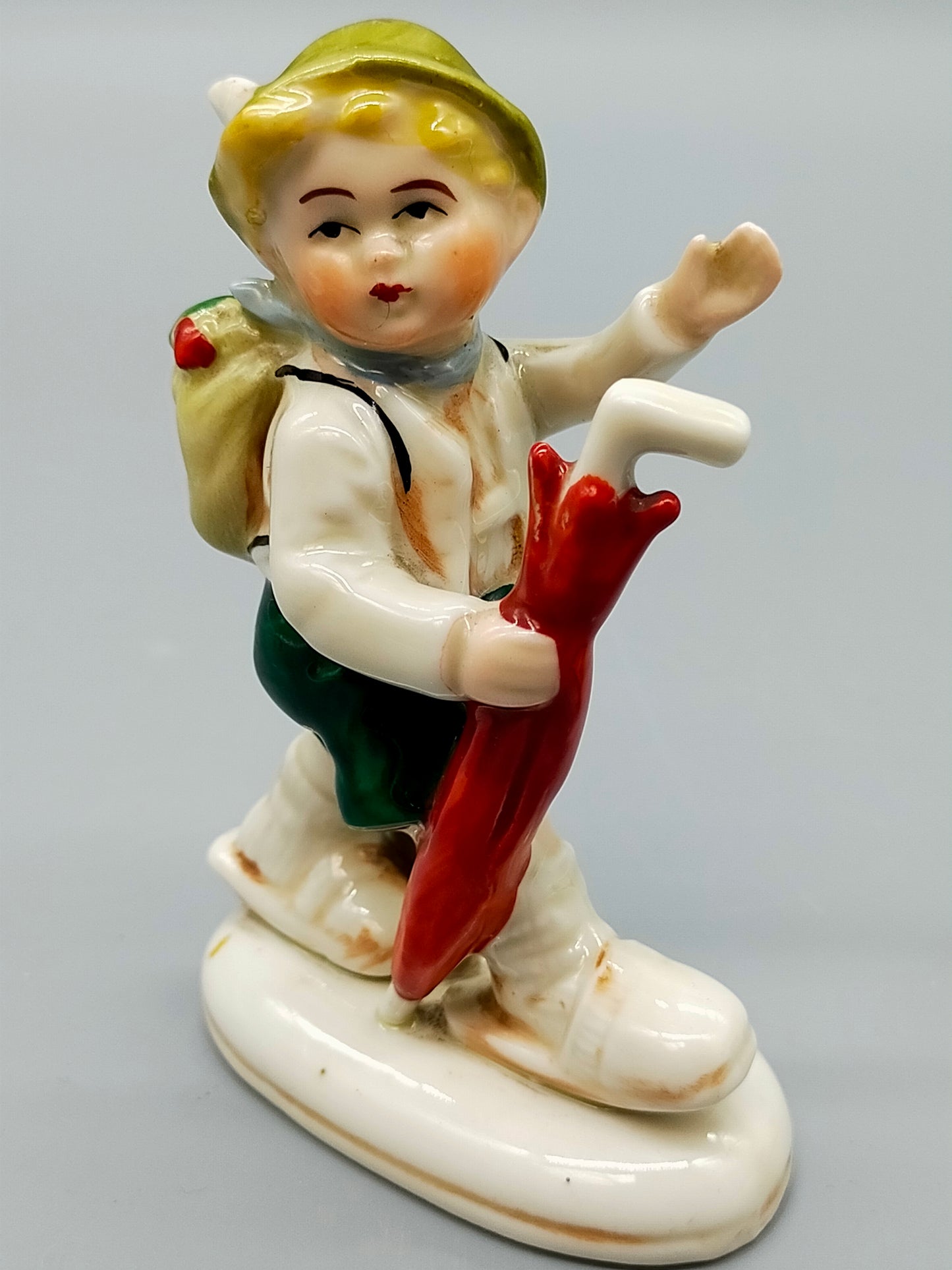 Vintage Porzellan Figur Wanderjunge mit Regenschirm Klassisches Design