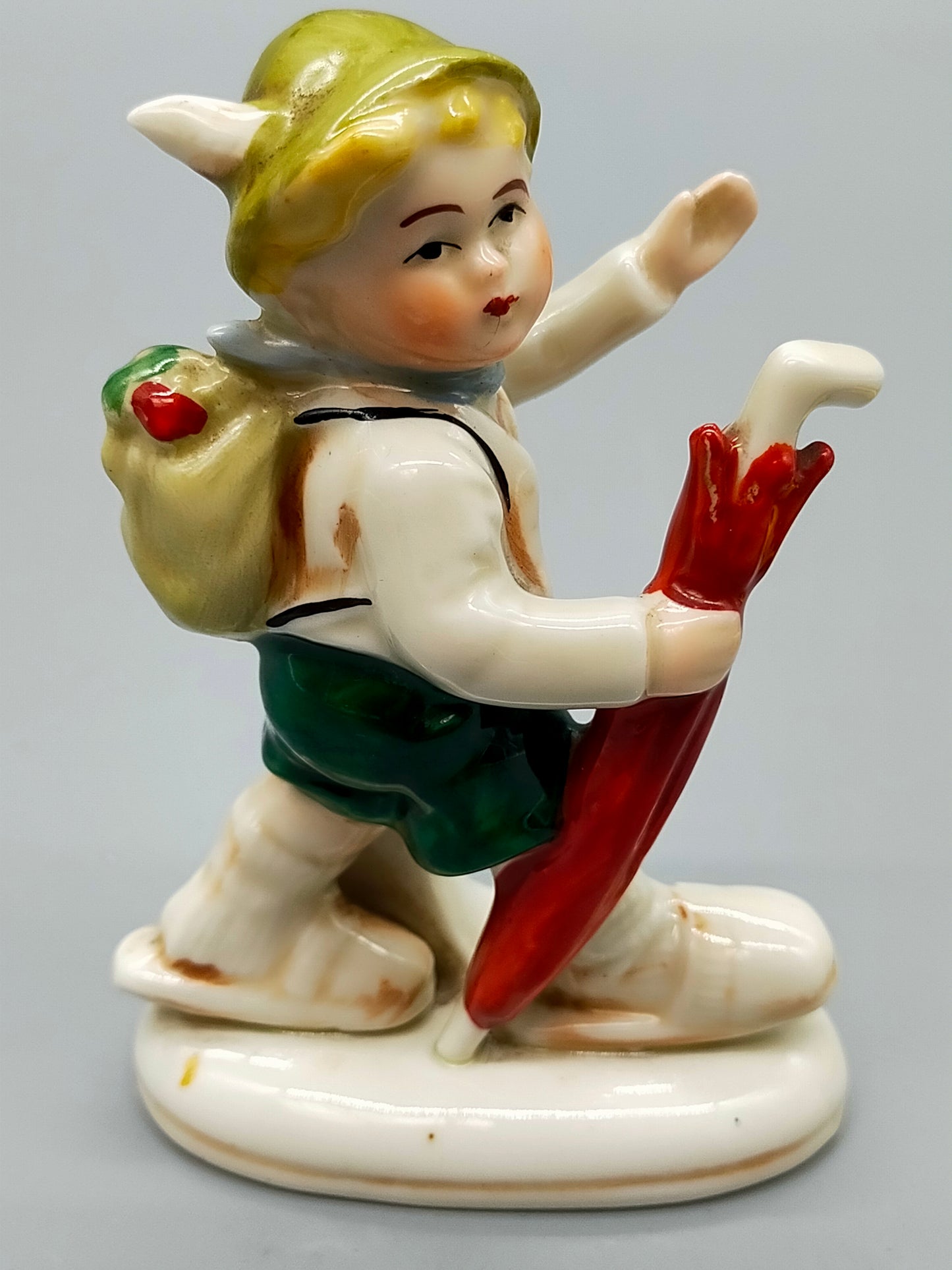 Vintage Porzellan Figur Wanderjunge mit Regenschirm Klassisches Design