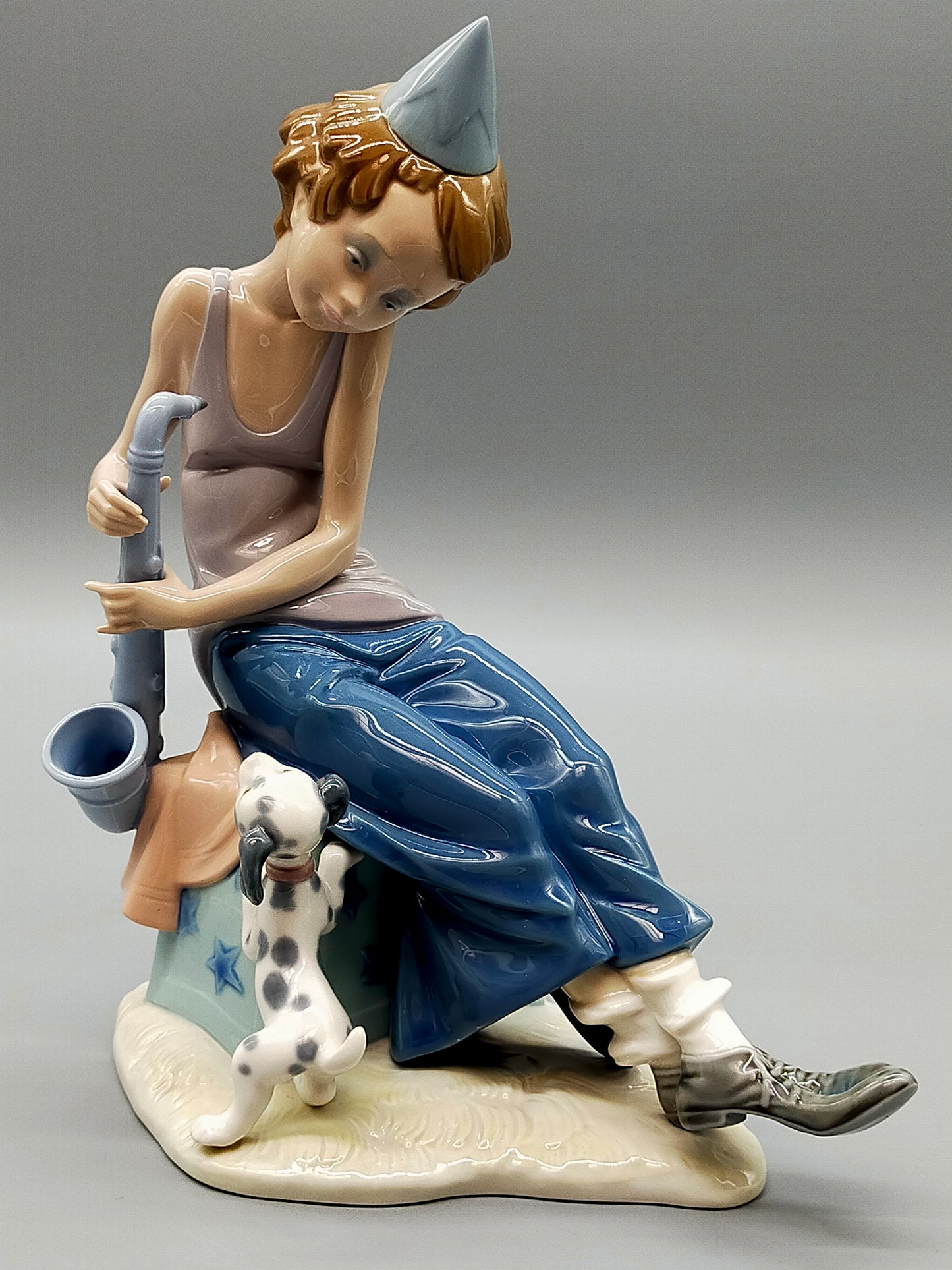 Lladró Porzellan Figur Sad Sax Junge mit Saxophon & Hund
