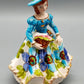 Vintage Porzellan Musical Figurine Elegant gekleidete Dame Blumenkorb