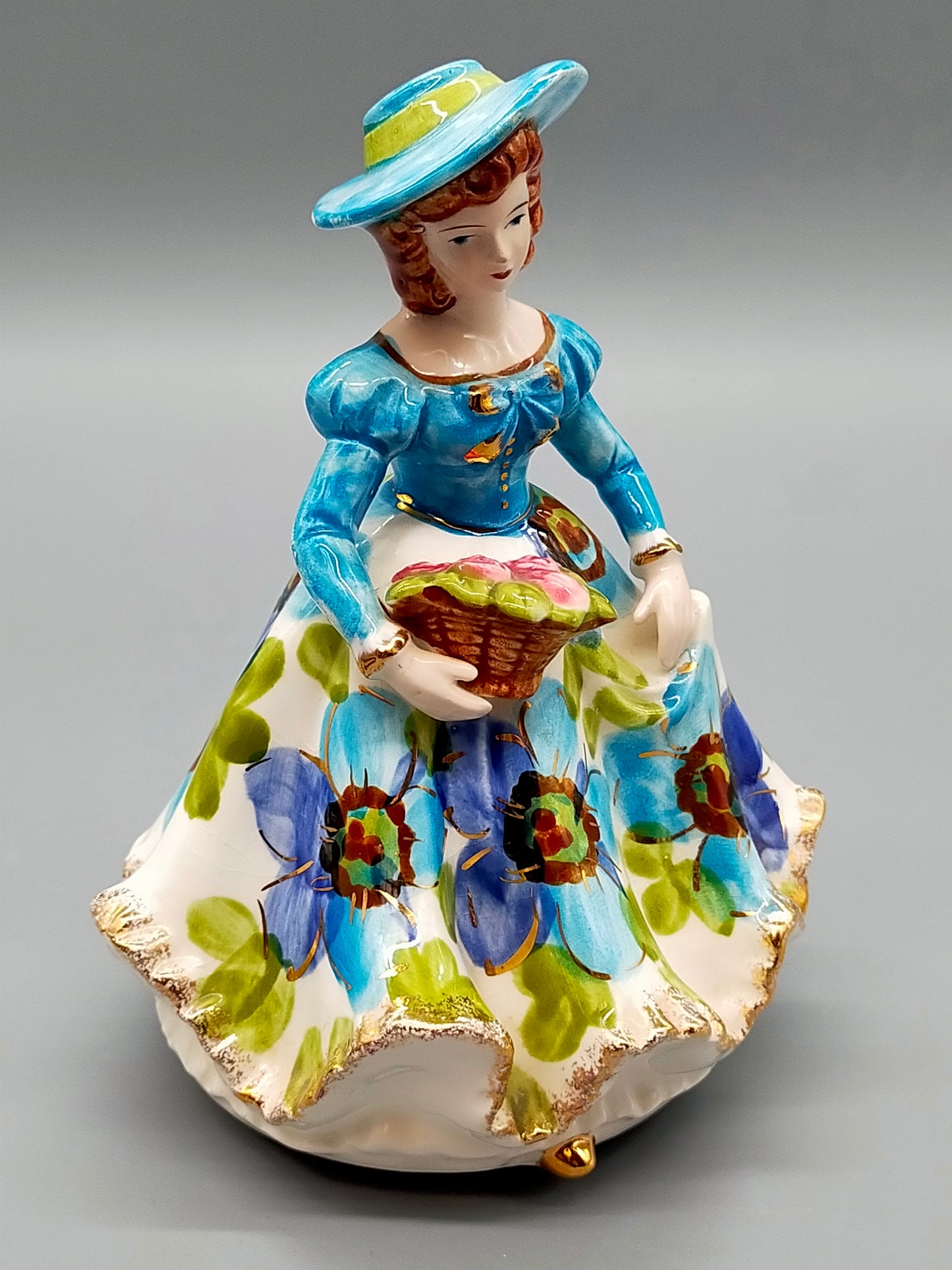 Vintage Porzellan Musical Figurine Elegant gekleidete Dame Blumenkorb