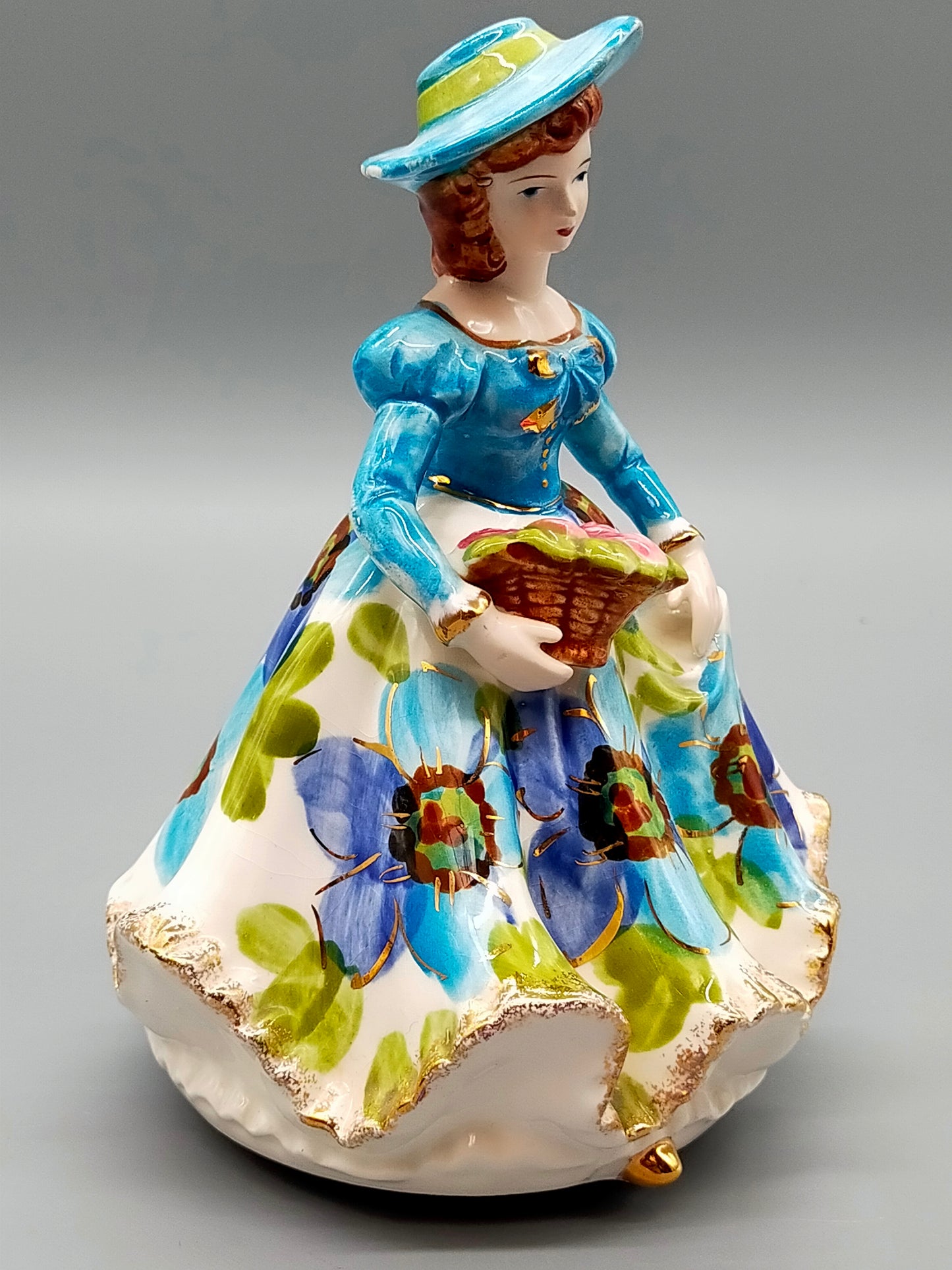 Vintage Porzellan Musical Figurine Elegant gekleidete Dame Blumenkorb