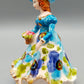 Vintage Porzellan Musical Figurine Elegant gekleidete Dame Blumenkorb