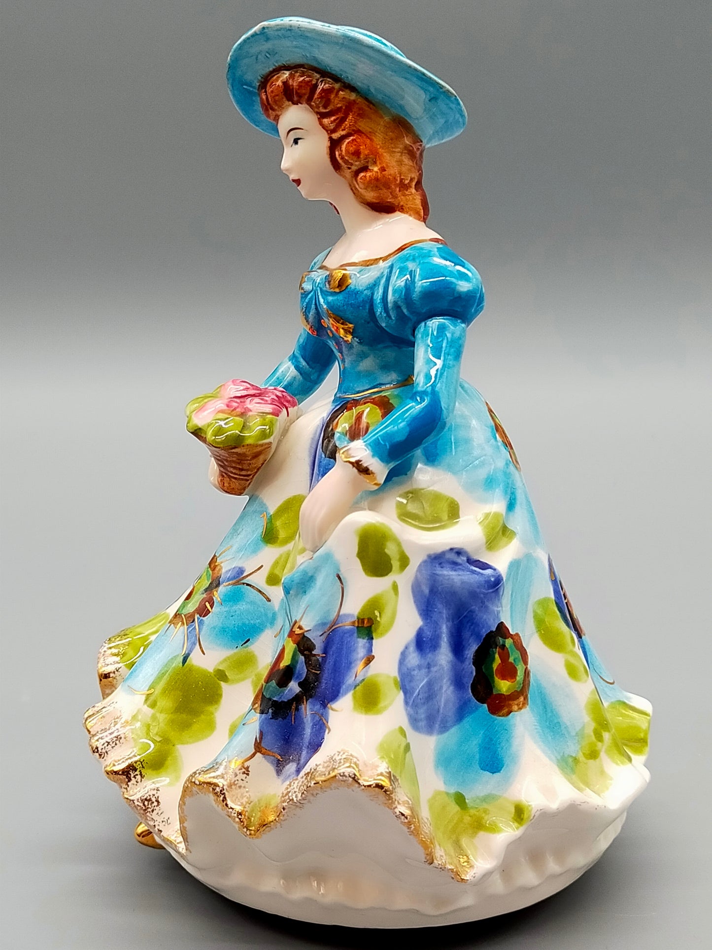 Vintage Porzellan Musical Figurine Elegant gekleidete Dame Blumenkorb