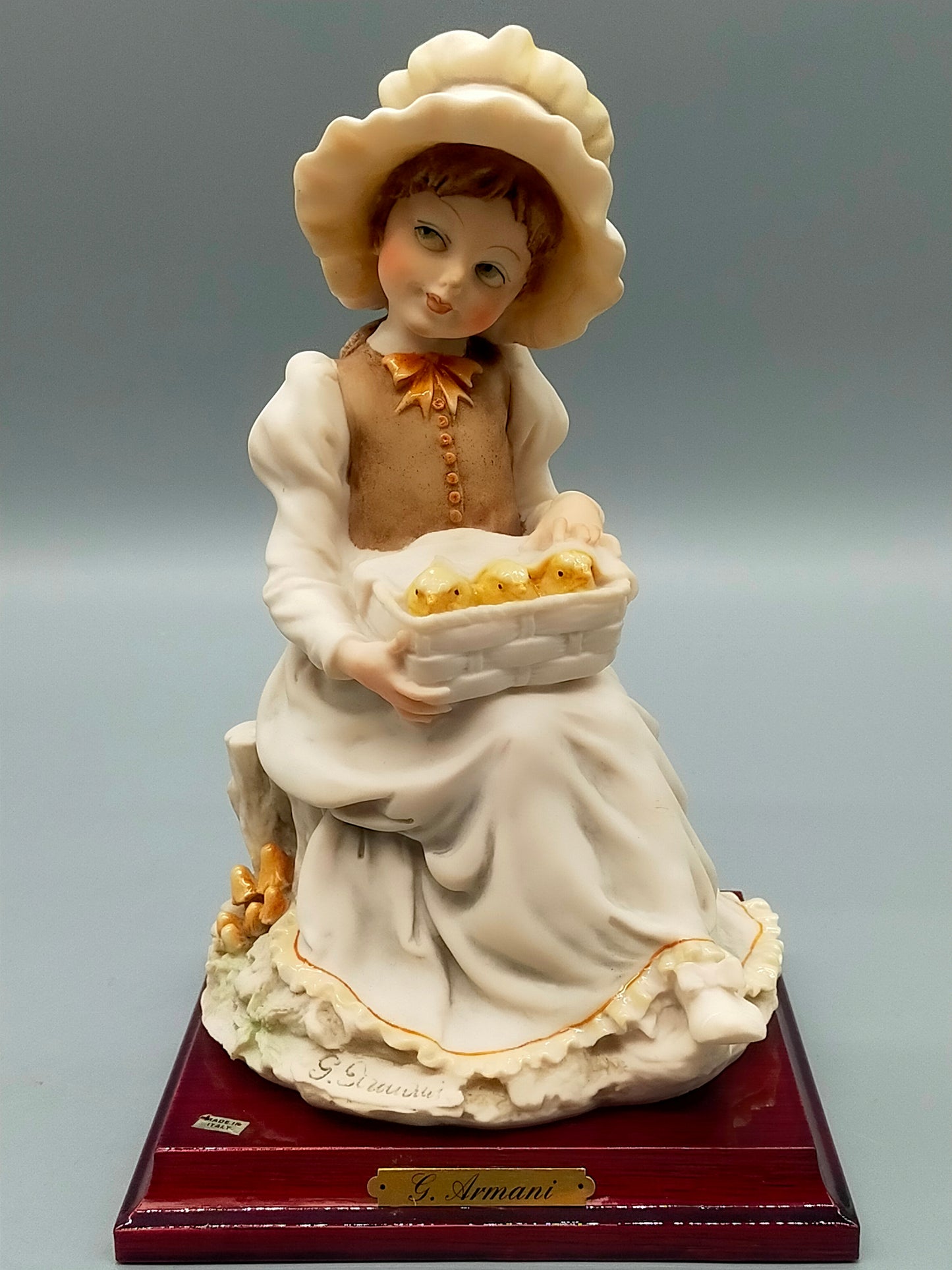 Giuseppe Armani Porzellanfigur – Mädchen mit Küken im Korb (1982)