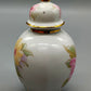 Porzellan Deckeldose T. Limoges Blumenmotiv mit Goldverzierungen