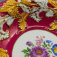 Meissen Prunk-Zierteller – Purpur Fond mit Reliefgold und Blumen 1 Wahl